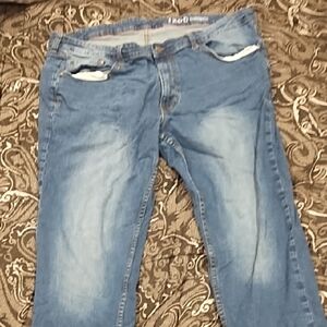 Izod Men's Light Blue Slim Straight Jeans